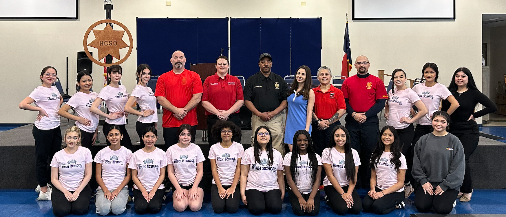 NO QUEEN LEFT BEHIND queens and staff group photo at HCSO gymnasium